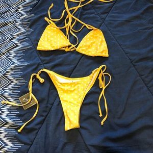 Yellow and white polka dot bathing suit